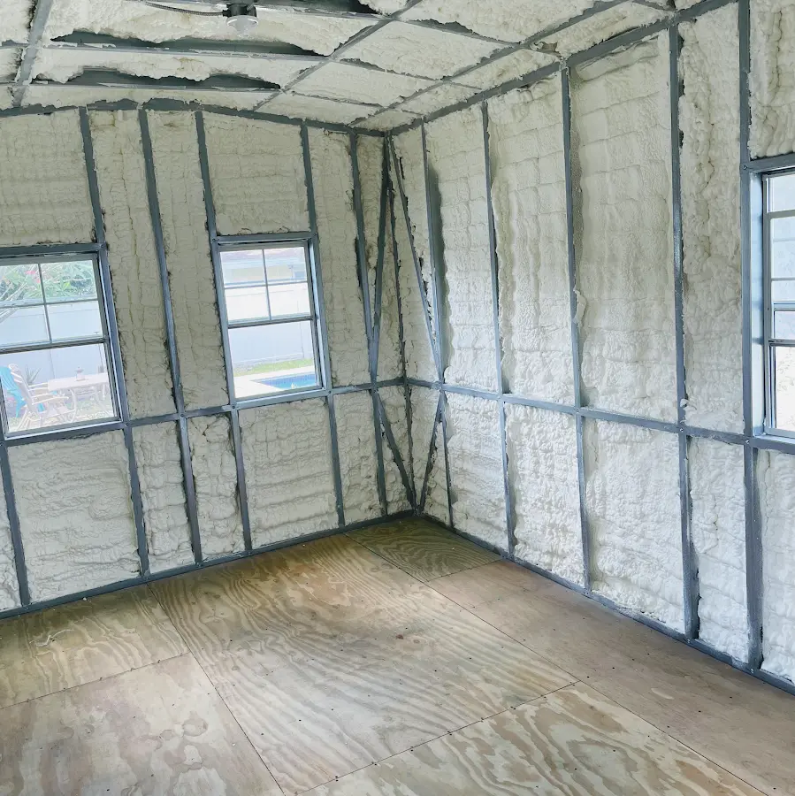 Closed-cell spray foam insulation applied to wall cavities in a residential project in Ephrata